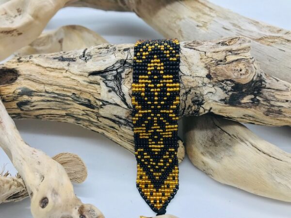 Perlenarmband schwarz gold
