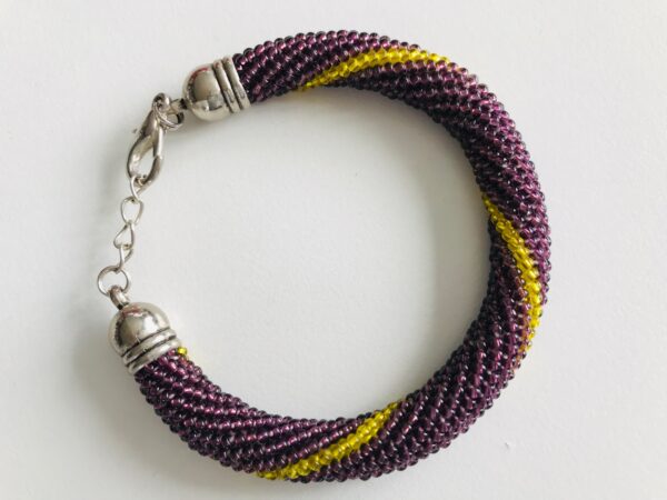 Armband violett gelb Perlen