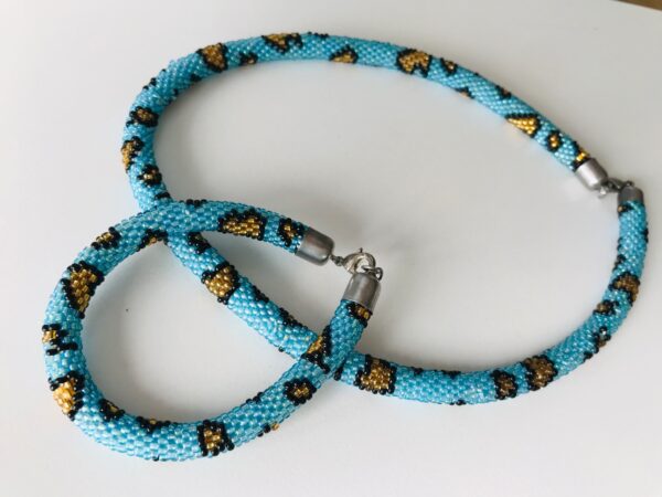 Halsband und Armband Set Panther Perlen - Image 2