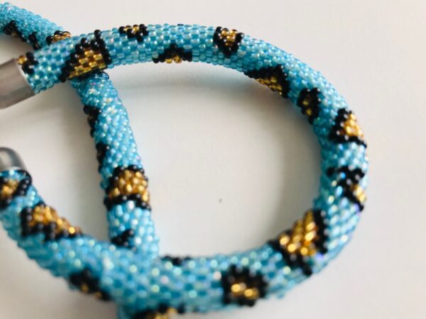 Halsband und Armband Set Panther Perlen - Image 3